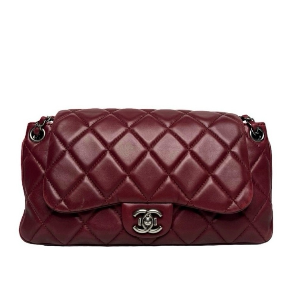 CHANEL • FLAP BAG (PRICE TAG OF $4,200 INCLUDED)